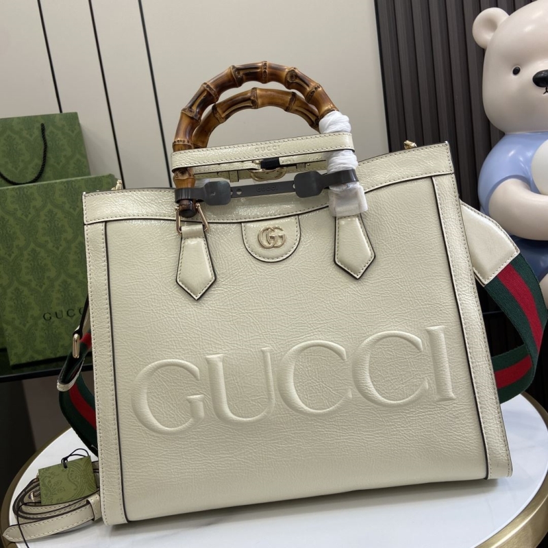 G*u*i top handle bags